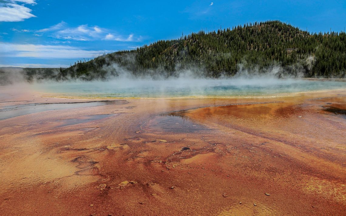 Steam Rises From The Grand Prismatic Spring In Yellowstone Natio