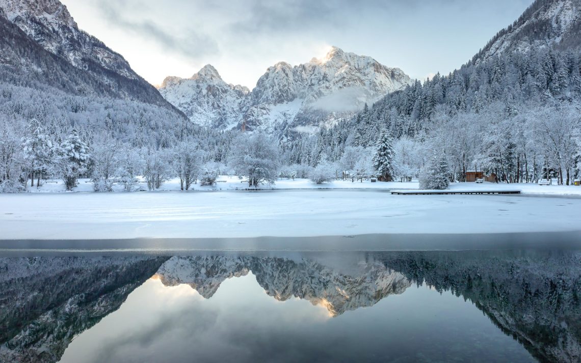 Lake Jasna In Winter Near Kranjska Gora, Slovenia. Snow On Lands
