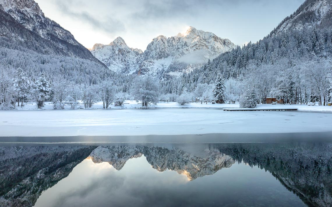 Lake Jasna In Winter Near Kranjska Gora, Slovenia. Snow On Lands