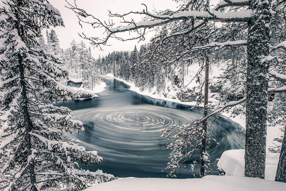 Spinning Ice At Myllykoski Rapids At Oulanka River Kuusamo Finla